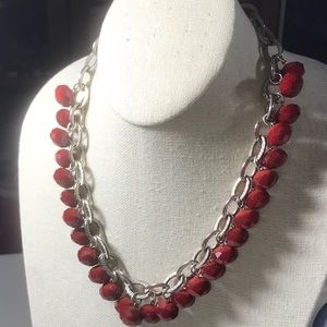 Red beaded necklace in silver tone